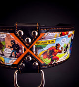 Close-up of a finished Bestia custom collar: printed artwork panels, orange X cross and stitching, steel D-ring