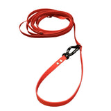 Long red leash for dog training. 