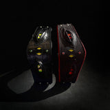 The Blood Dragon Collar in red next to the Night Dragon Collar in black - two wide leather dog collars with dragon eyes, side by side