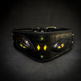 The Night Dragon Collar - wide black croc-embossed leather dog collar with two green dragon eyes, yellow diamond inlays and green crystals, front view